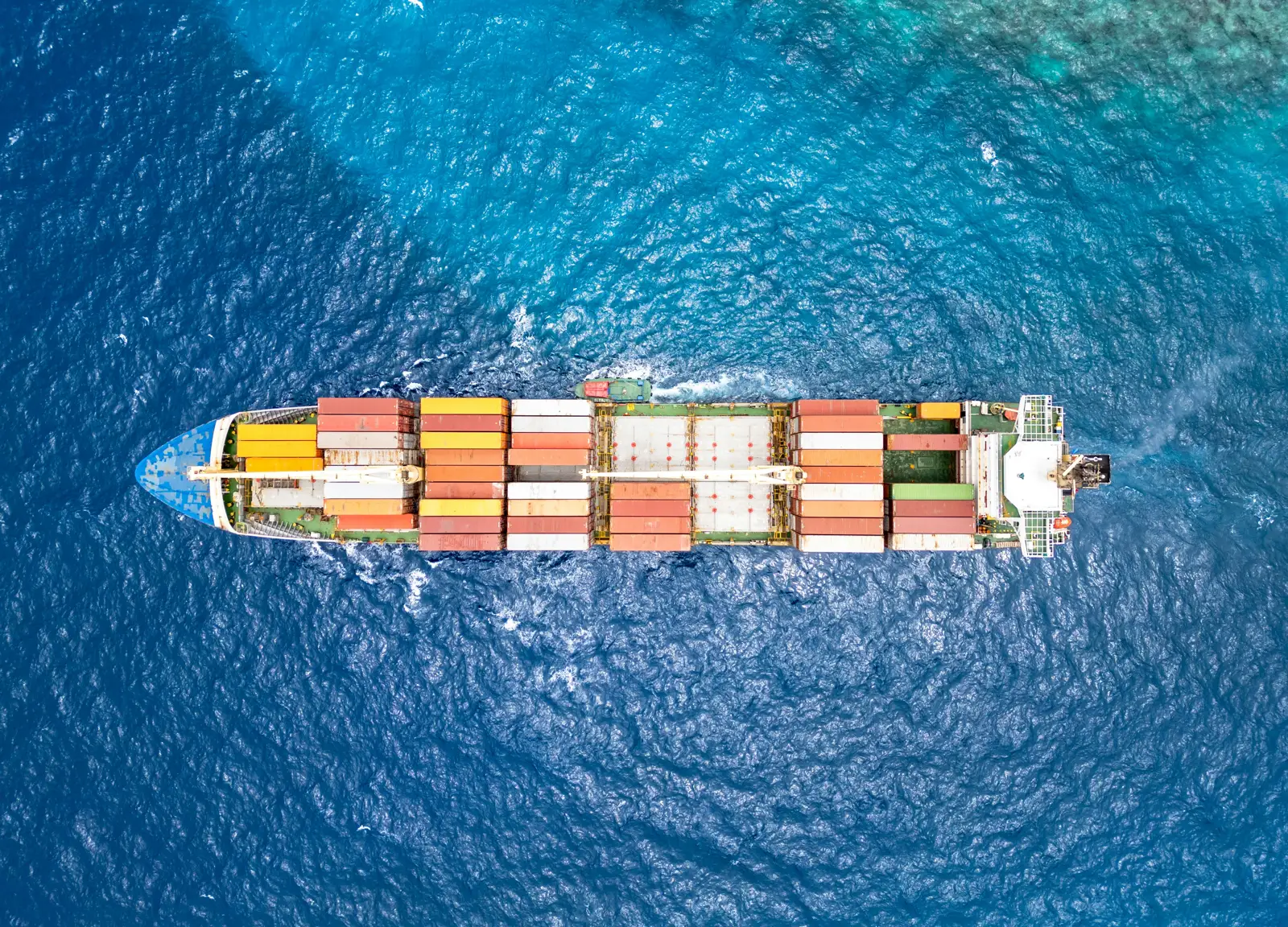 Aerial view of a container ship crossing the Pacific Ocean